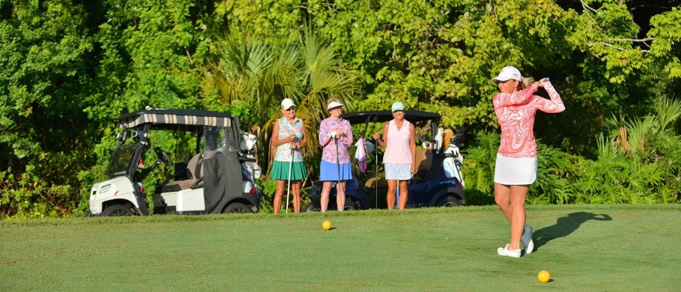 women golfing